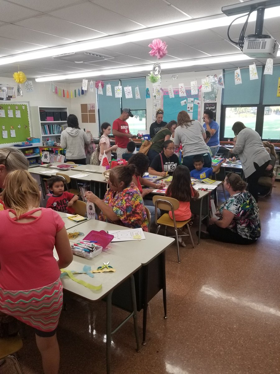 TeachKaminski's tweet photo. Family literacy night is "Out of this World" at JeNeir! @PrincipalLVS can always draw a crowd ready to read and create! #literacy #wearemomence https://t.co/ThJMVvgJ7K