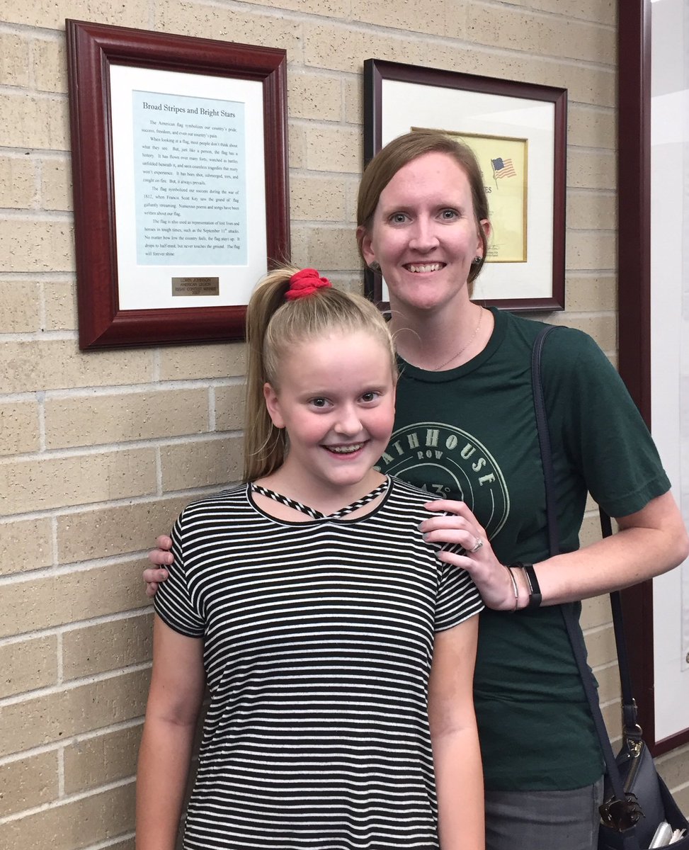 deme_thomas's tweet photo. The Legacy continues as MMJH alum Lorin Johnson Davies @lorinfdavies returns for open house with her daughter Elliot as they stand in front of Mom’s 2002 award winning essay on display #watchmmjhlead https://t.co/AgCehIq2kj
