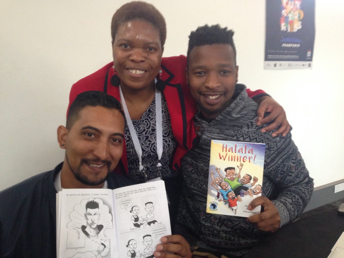 Cover2CoverB's tweet photo. Xolisa Guzulu with the Kwezi team - their character Kwezi features in our multilingual comic Halala Winner! https://t.co/y8DlmS6m0q