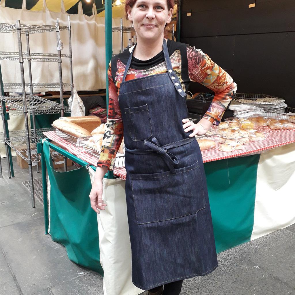 TheCupboard4's tweet photo. And here we have the lovely Beth from the bread stall modelling my new apron. Excellent quality denim and great shape. Available @thecupboard4 @markethallshrewsbury #sustainablehousewares #classicdesign #qualitytextiles #teatowels #dusters #dishcloths #mops #brooms #enamelware https://t.co/WDdHTPcgGa