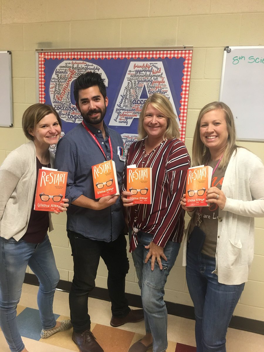 BunsoldMS's tweet photo. In celebration of National Read a Book Day, some 8th grade teachers pose with Restart—the novel selected for read aloud during the first 10 minutes of homeroom everyday. Thanks for promoting literacy and empathy, teachers! @MarysvilleEVSD @DianeMankins https://t.co/JReSkIl0Pc