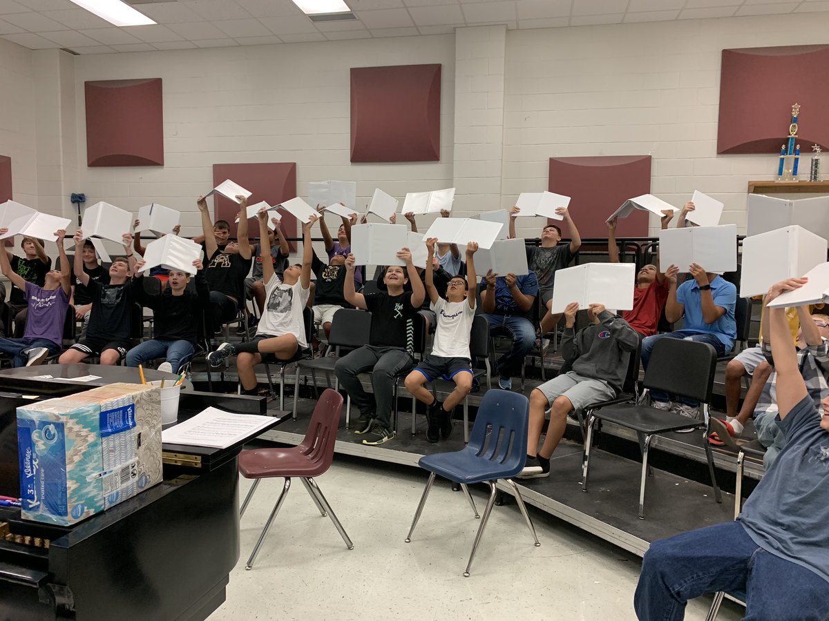 At GMS, we like to teach proper choral etiquette. If you hold your music higher, that means you sing better, right?