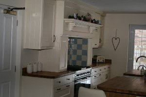 Bespoke Overmantle With Hand Made Tiles cumbriakitchens.co.uk/l/371