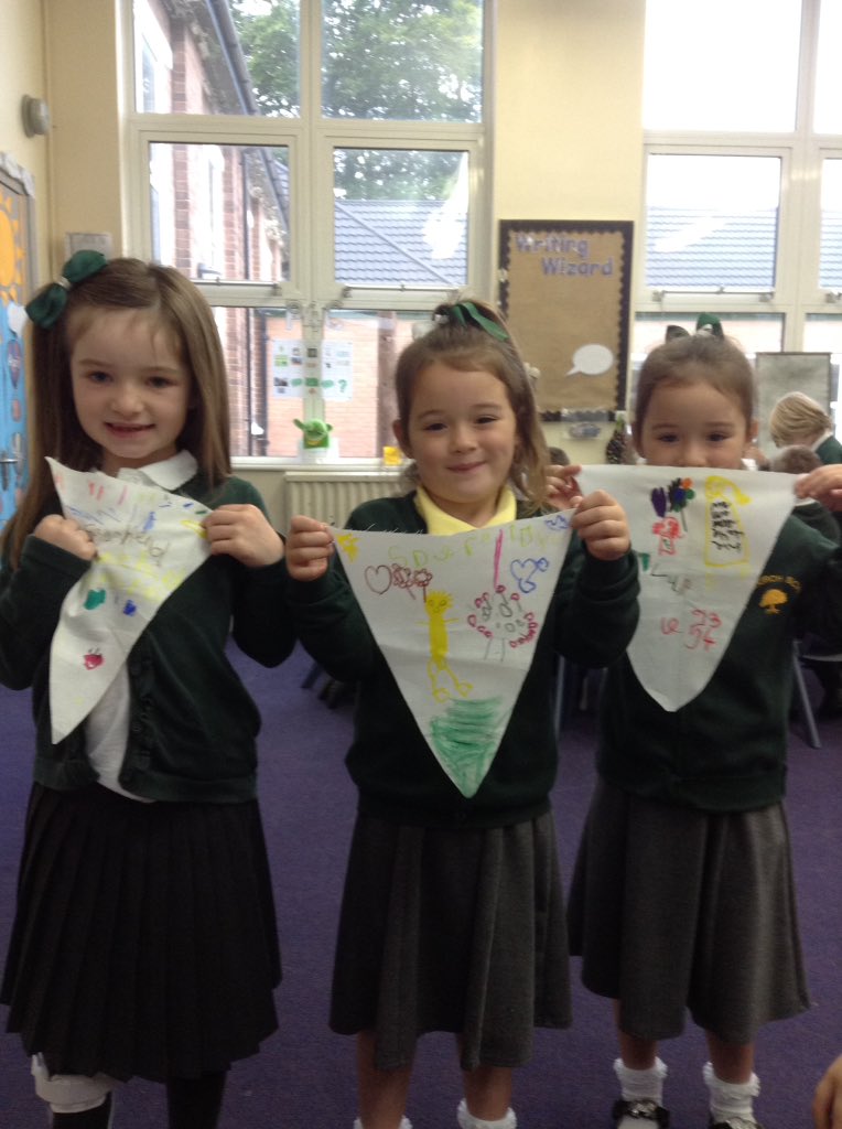 Overchurch5's tweet photo. We have each decorated a triangle that Mrs Collins @Overchurch2 is going to sew and join together to make bunting ready for Wednesday's cycling @TourofBritain. Here are a few of them! https://t.co/AHnHETQe1j