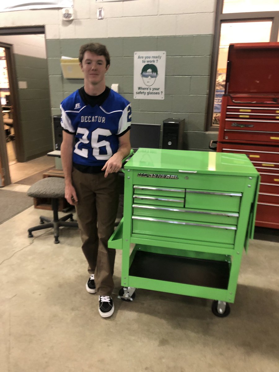 AutoShopWorTech's tweet image. Auto student Max Green is ready to work. His collection of new and used hand tools are neatly organized and locked securely within his green tool box.