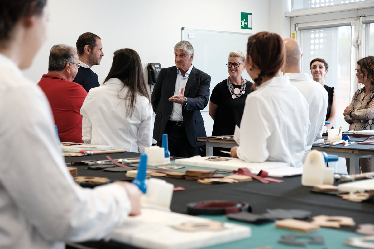 LVMH's tweet photo. Today, Antonio Belloni (Group Managing Director, LVMH) visited @polimoda and met with the apprentices of the Leather promotion of the Istituto dei Mestieri d’Eccellenza LVMH. They had the opportunity to discuss with him and show him their savoir-faire.
#IMELVMH https://t.co/2DCw87mryv