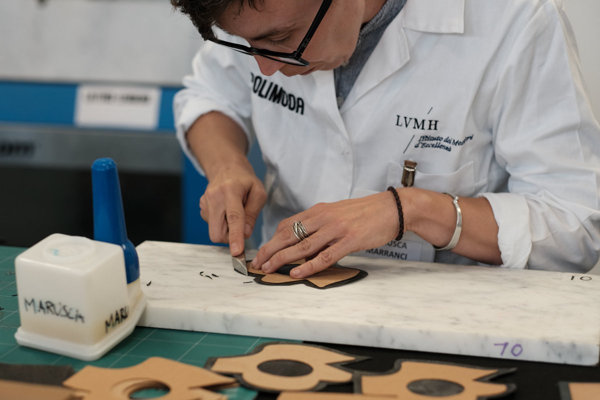 LVMH's tweet photo. Today, Antonio Belloni (Group Managing Director, LVMH) visited @polimoda and met with the apprentices of the Leather promotion of the Istituto dei Mestieri d’Eccellenza LVMH. They had the opportunity to discuss with him and show him their savoir-faire.
#IMELVMH https://t.co/2DCw87mryv