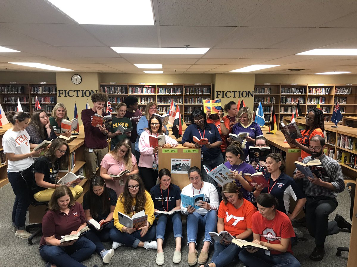 KeyMSLibrary's tweet photo. Key MS teachers read on National Read a Book Day #FCPSReadsBooks @KeyMiddle https://t.co/no5wLBCgTy