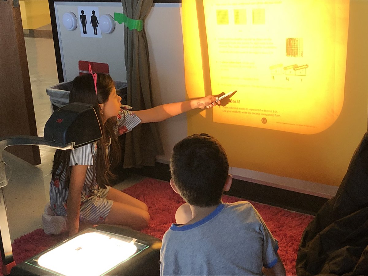 Rocking our learning...Old School! A little decimal work and collaboration during Social Studies!
My little girl: Mr. Collett! What’s that?!?!
Me: That’s what we used as a “Smart Board” during the before times.
My little girl: 😶🦗