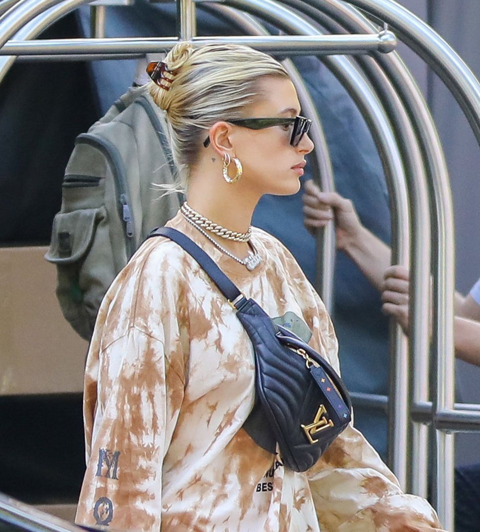Louis Vuitton New Wave Bum Bag worn by Hailey Baldwin With Maeve Reilly on  September 5, 2019