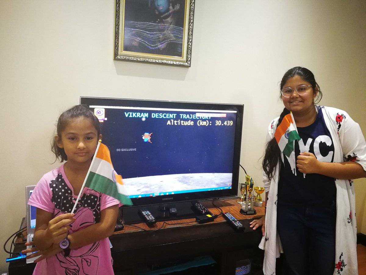rameshdadhich's tweet photo. Proud moment for India.. Himani and Jahnavi witnessing the glorious moment #Chandrayaan2Live @narendramodi  #Bahrain https://t.co/HJbQtr2TnE