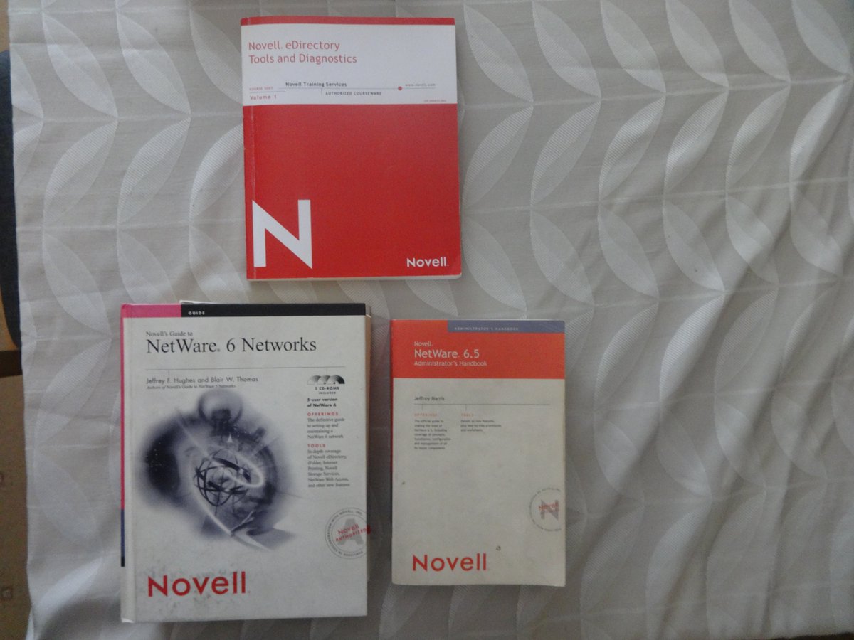 nikolausbaker's tweet image. Netware!  A few books of mine. Who remembers this superior file and print networking system?😎#Technology #Netware #networks #coding