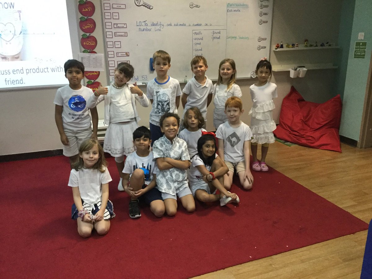 DIA_Year3's tweet photo. Year 3 children turning Emirates Hills white to acknowledge World Peace Day. https://t.co/dow8fDssd8