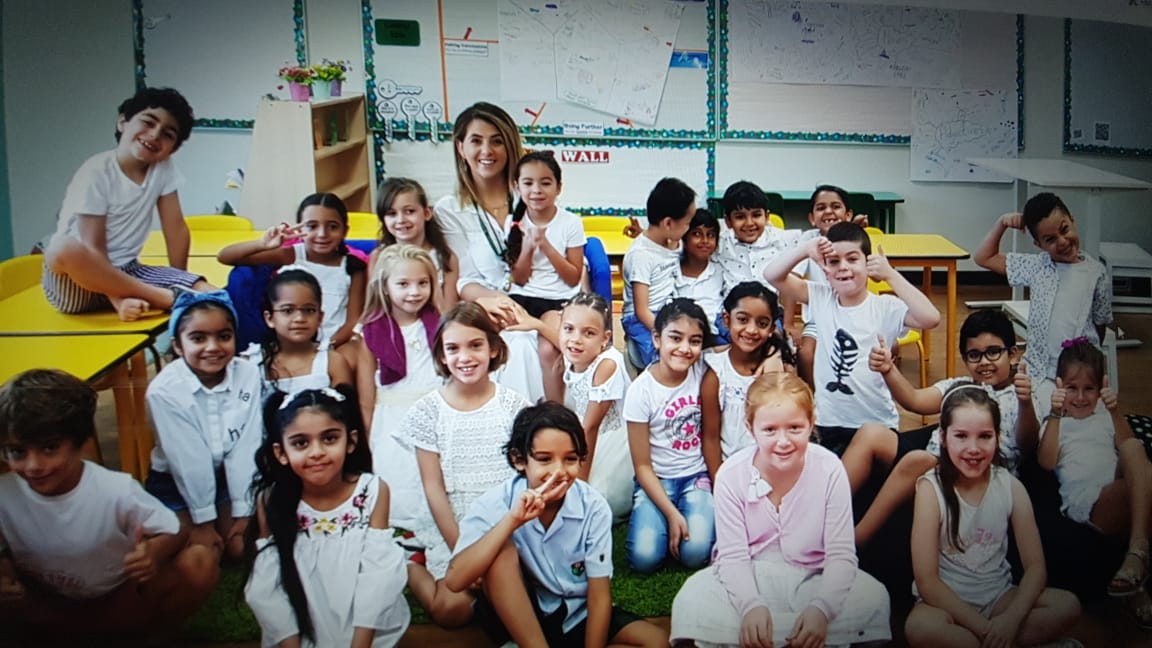 DIA_Year3's tweet photo. Year 3 children turning Emirates Hills white to acknowledge World Peace Day. https://t.co/dow8fDssd8