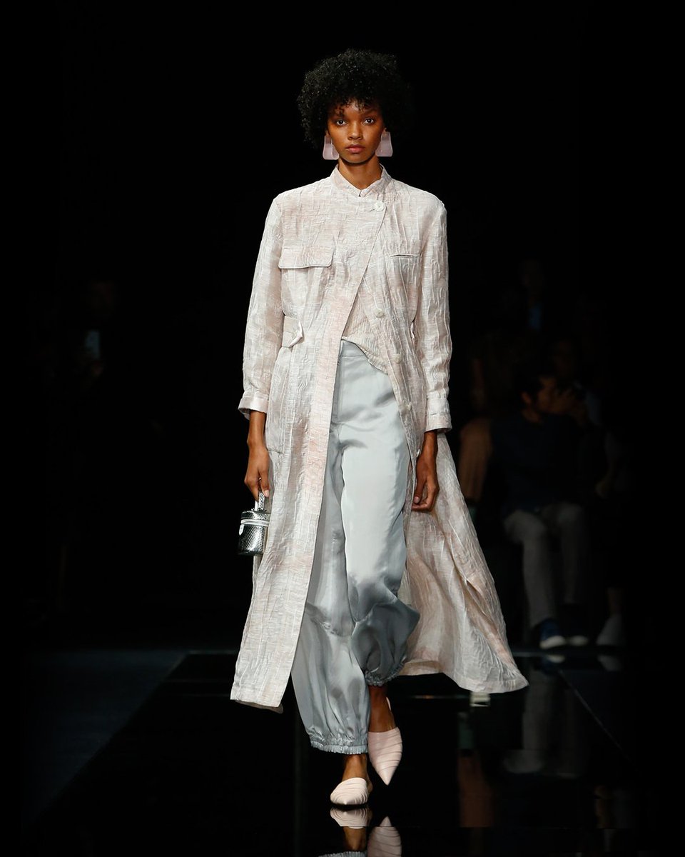 armani's tweet image. Soft pinks and silver hues create shimmery illusions in the #EmporioArmani women’s SS20 fashion show #mfw