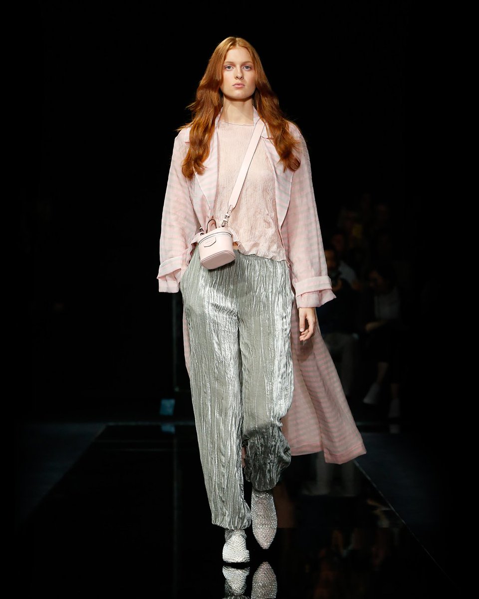 armani's tweet image. Soft pinks and silver hues create shimmery illusions in the #EmporioArmani women’s SS20 fashion show #mfw