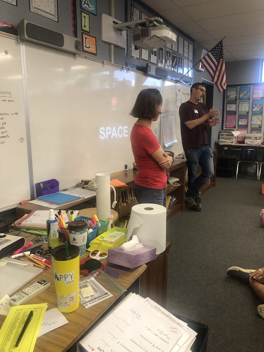 TracieFrench's tweet photo. Such a special morning when a student’s parents who work for Virgin Orbit come in and teach the class about space! #realliferocketscientists #weareweaver @Weaverwhales https://t.co/K7rYMNZ8JU