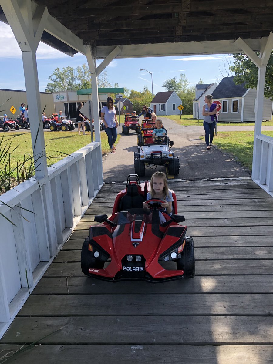 One of our favorite parts...driving our “cars” around the village. Thanks for our rides,  <a href="/PegPeregoUSA/">Peg Perego USA</a>!
