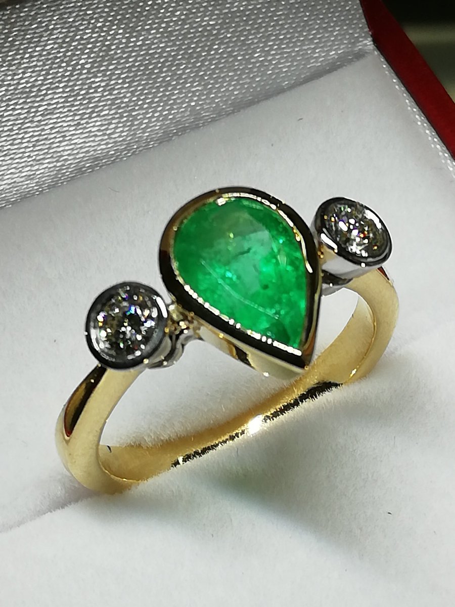 A stunning pear shaped emerald handmade into a stunning ring with diamonds. #emerald #fashion #Diamonds