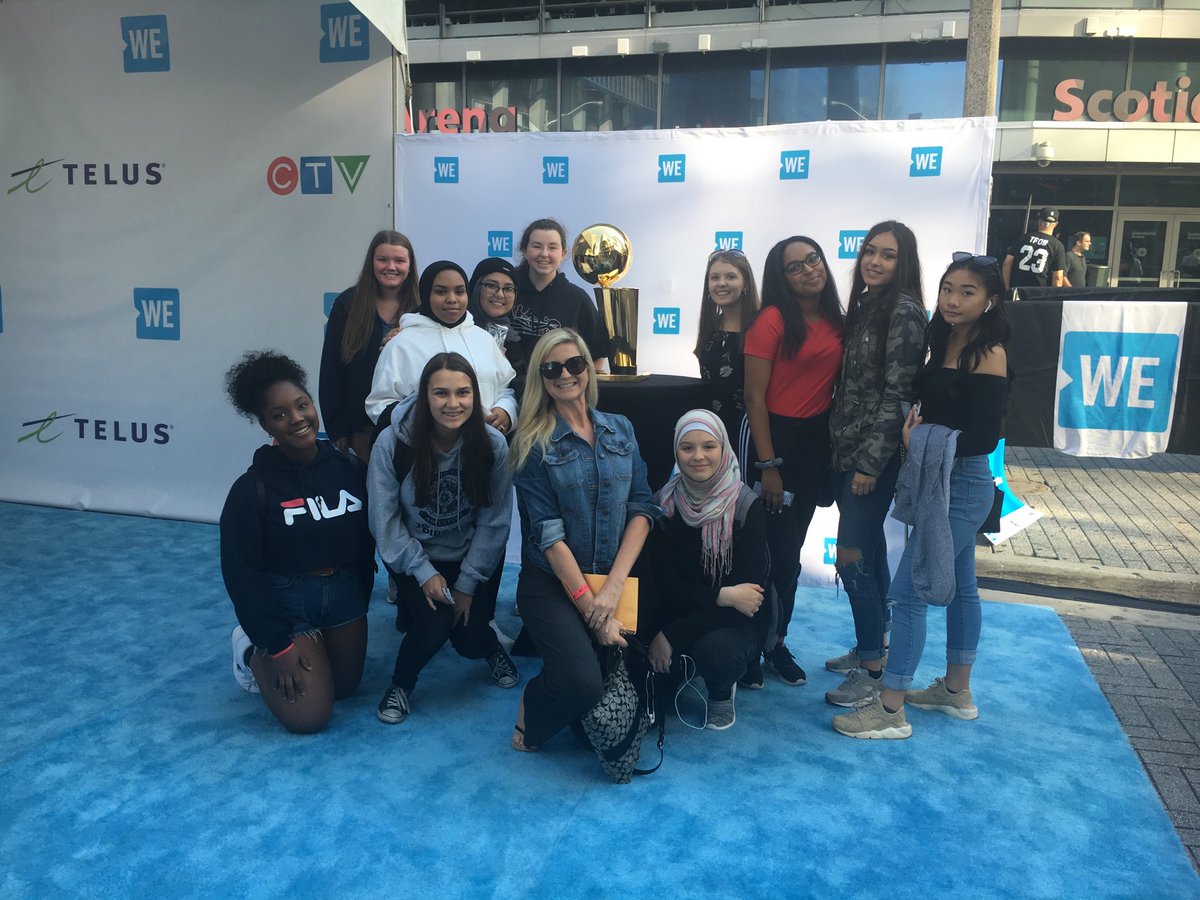 BrensJennifer's tweet photo. WE Day crew posing with the @TorontoRaptors_ NBA championship trophy! @MsGilmore5 #WeDayToronto https://t.co/UXv9RMQwTL