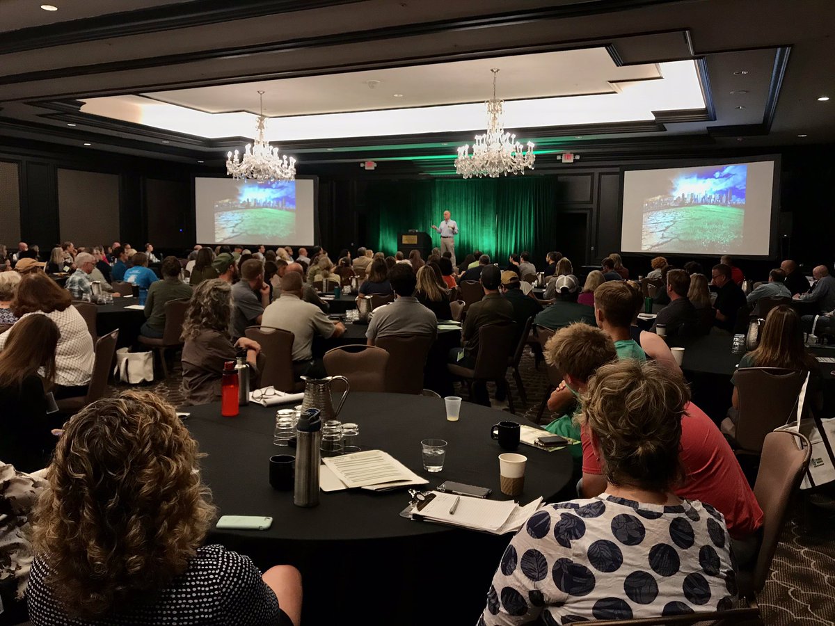 PlanItNative's tweet photo. Doug Ladd kicking it off to a packed house at Plan It Native. “Nature and humans, influencing, interacting, and shaping each other - that’s the legacy of the evolution of our environment.” #PlanItNative19 https://t.co/221UiuJK3V