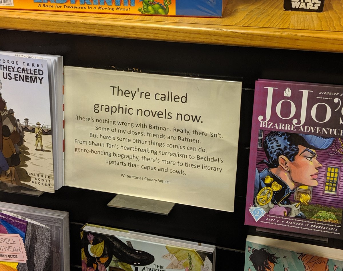 Sign in Waterstones Canary Wharf which says "They're called graphic novels now" and continue to complain about superheroes.