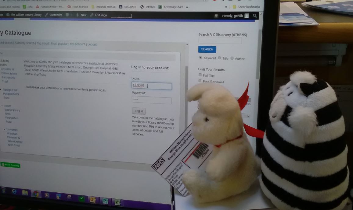 GEHSWFTLibrary's tweet photo. #Billythelibrarycat is showing Harvey how to renew his books online. The web page is https://t.co/uoYvzOGsem. All he needs is his Library ID and pin number. #teameliot #library https://t.co/FDpq4nq7Cg