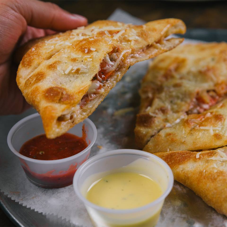 What does your face look like when you take that first bite of our cheesy Calzone? 😋🤤☺️ Tell us using GIFs!
.
.
.
.
#calzones #pizza #gourmetpizza #cheesy #TGIT #paliospizzacafe #webelieveinreal #crossroads #Texas