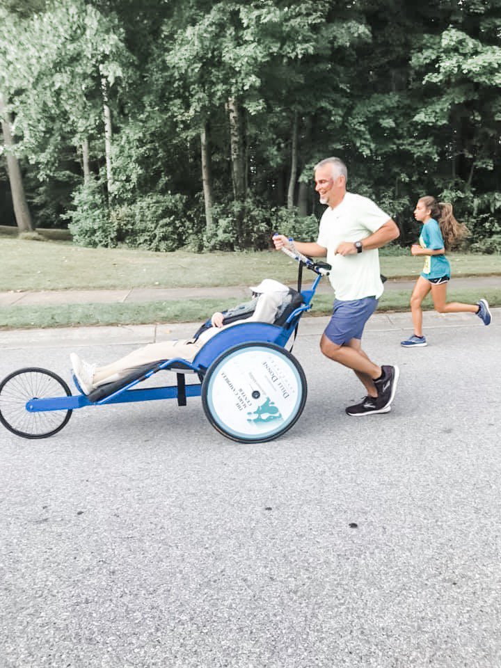 NickleElectric's tweet photo. Nickle's CFO ran the Little Sisters of the Poor Nun Run 5k last wknd. Neal pushed a 94-year-old resident in an adaptive racing chair from Fusion Inclusion. Their mission makes it possible for people with physical and cognitive challenges to participate in local races. @stevesinko https://t.co/lVepHt2QjR
