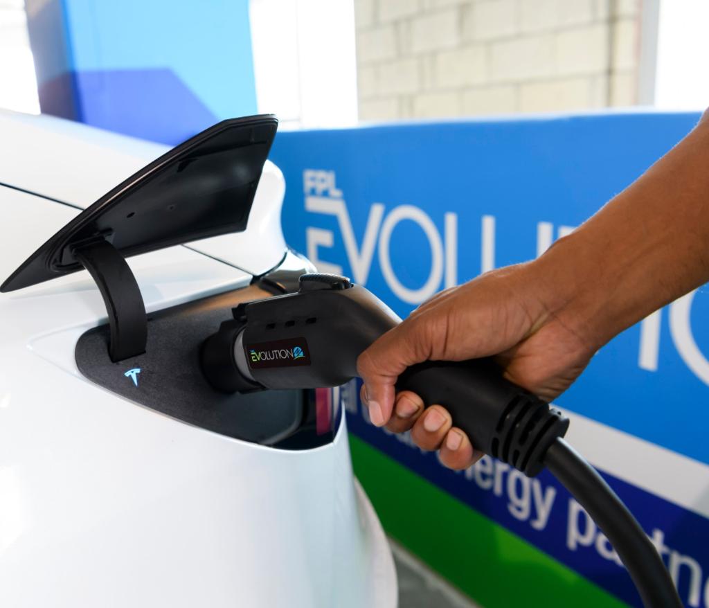 insideFPL's tweet photo. We're kicking off #NDEW2019 with a big announcement! @CityofPBG, @JupiterMedNews, and many more local orgs have joined the #FPLEVolution program. EV charging will be available at each location to help everyone drive a brighter future for Florida. https://t.co/wRk4DOgCWw