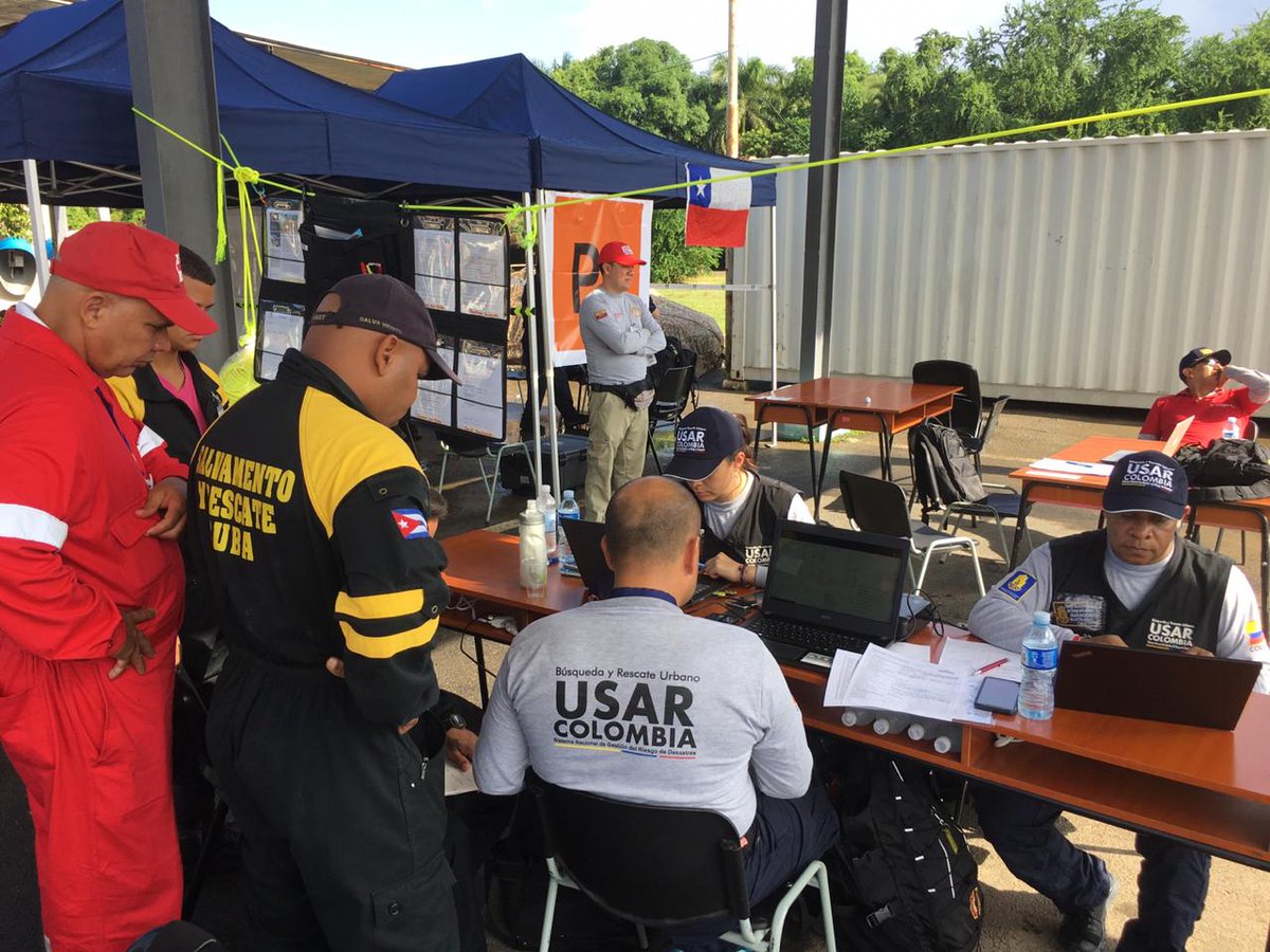 BomberosBogota's tweet photo. 👩🚒Nuestro equipo #USARCOL1 inició el ejercicio práctico que permite conocer las estructuras y capacidades nacionales e internacionales de respuesta en temas de Búsqueda y Rescate en Cuba en el marco del #SIMEX2019 Bajo los lineamientos @Insarag https://t.co/Yl4x7dxX0m https://t.co/UaY9gXE0WE