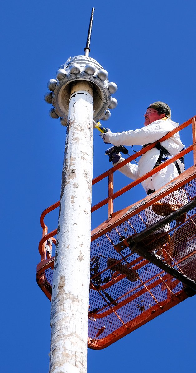 Painter Matthew Graper of F.A. Gray, works on the restoration of the Liberty Pole, a 110-foot wooden mast, in <a href="/prescottparknh/">Prescott Park</a> in #PortsmouthNH this week. #streetphotography <a href="/seacoastonline/">Seacoastonline.com</a>