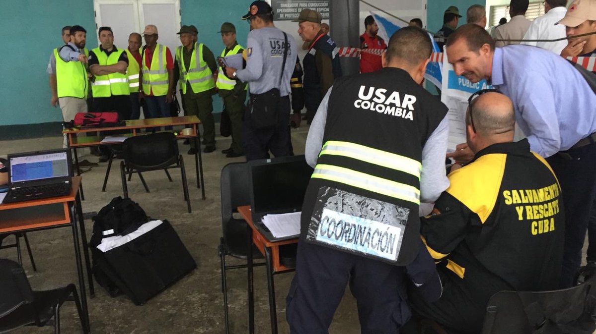 BomberosBogota's tweet photo. 👩🚒Nuestro equipo #USARCOL1 inició el ejercicio práctico que permite conocer las estructuras y capacidades nacionales e internacionales de respuesta en temas de Búsqueda y Rescate en Cuba en el marco del #SIMEX2019 Bajo los lineamientos @Insarag https://t.co/Yl4x7dxX0m https://t.co/UaY9gXE0WE