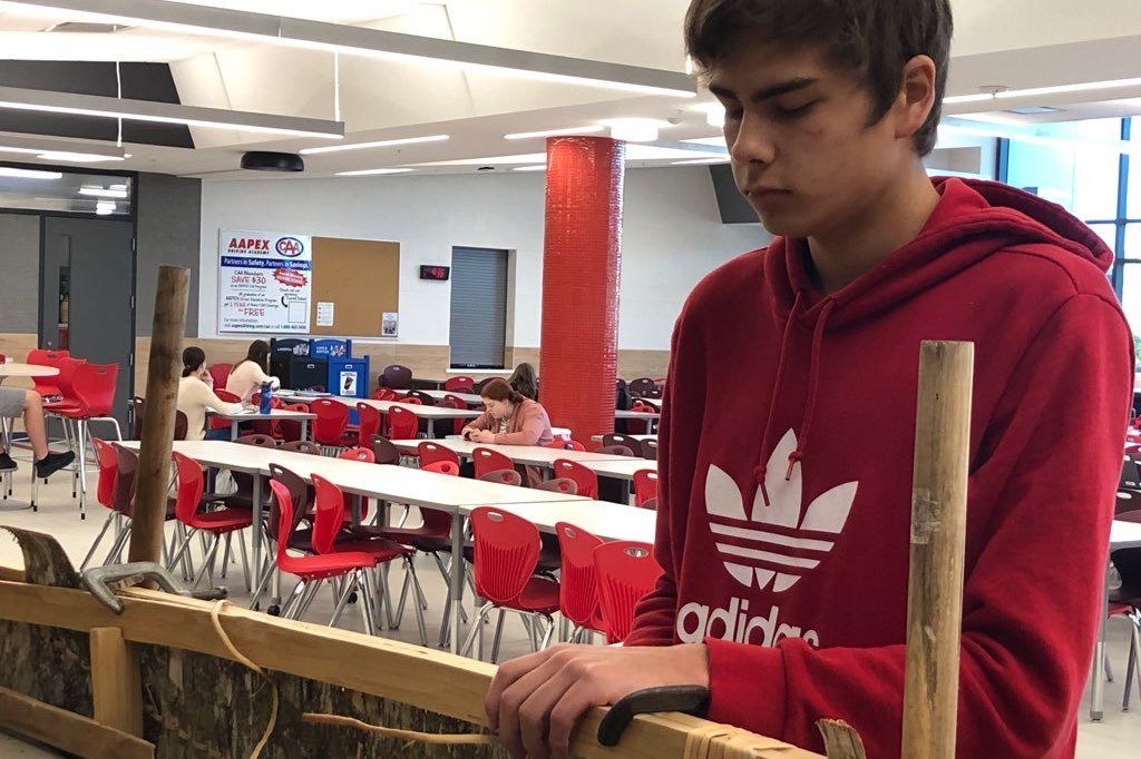 DsbnOyap's tweet photo. On the third day of the @DSBN canoe build, students worked to secure the sides and gun whales in a process known as lashing. Students are learning first hand and hands on from Master Birch Bark Canoe Maker Chuck Commanda. @dsbn_Indigenous @OYAPNiagara #LearnFromAMaster https://t.co/SwaDahdy6f