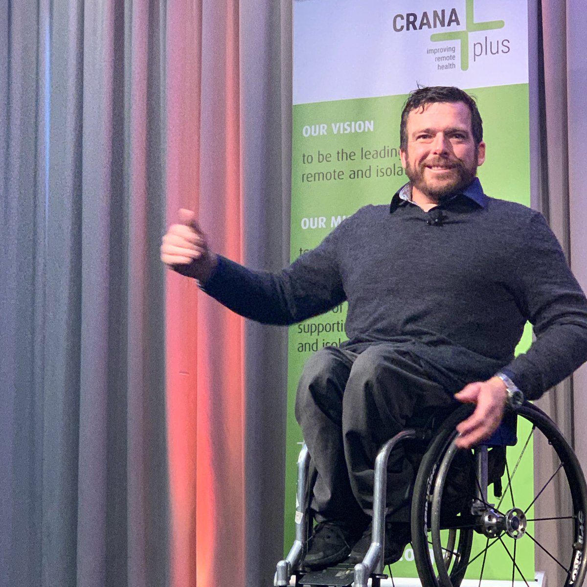 CRANAplus's tweet photo. @kurtfearnley presents a lively and moving keynote address to #CRANA19 about the power of turning struggle into strength, for himself and others. https://t.co/gO9Xlwsddd