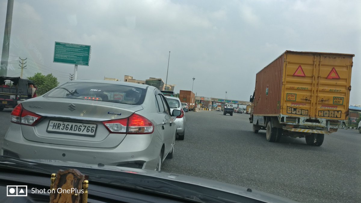 merijabaan's tweet photo. A kilometer long line at #KherkidaulaToll , today morning. Crossing time 10 minutes, #pollution #jam #TimeKilling despite I have #MonthlyPass and was in right #FASTagLane.
Thank you @NHAISocialmedia for curbing pollution and saving commuters time. 
@OfficeOfNG 
@DXPAssociation https://t.co/euVrvD5ltY