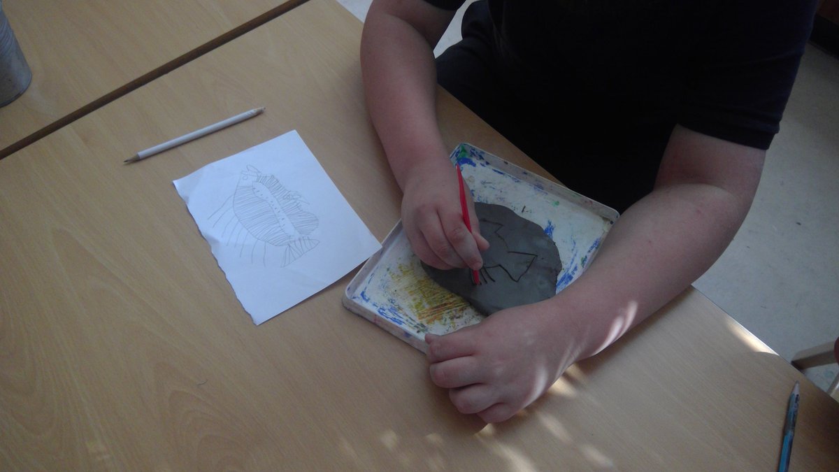 DenbeathP6_7's tweet photo. Step 2 - We flattened our clay and started to sketch our fossil implant. https://t.co/O9evmPF5TZ