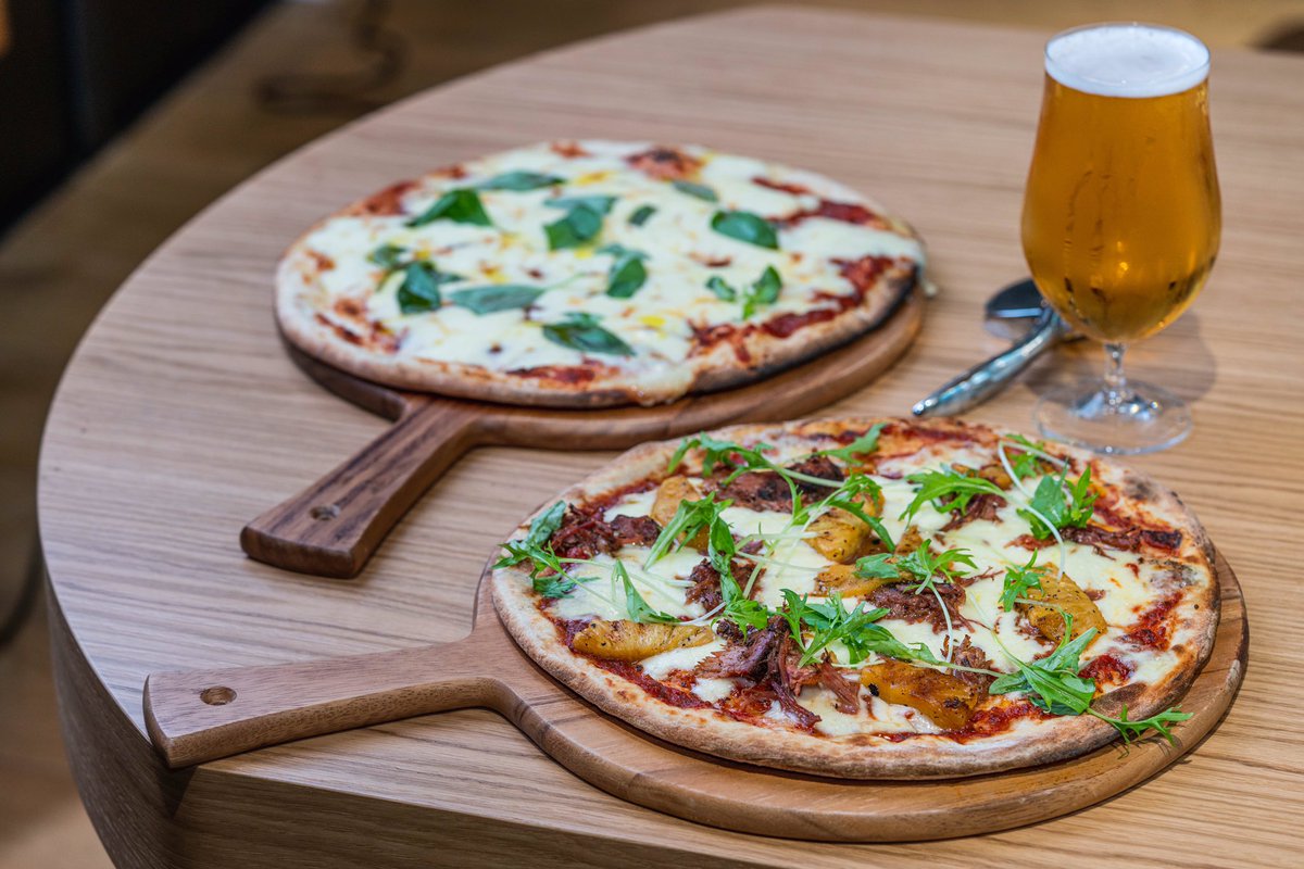 Our bar and kitchen, the heart of the XYZ Social space, is the perfect stop for slice of pizza and a catch up with colleagues. #SliceOfSocial #XYZSocial