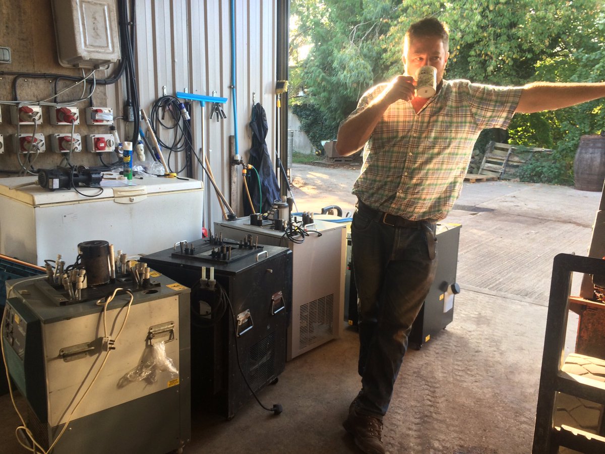 FarmersOfTheUK's tweet photo. Tom having a quick coffee before his next job. These are some of the chillers thar are essential equipment when running successful bars at the many events we go to @severn_cider #eventhire #barhire #bar #quickcuppa https://t.co/vA0iduYBsY