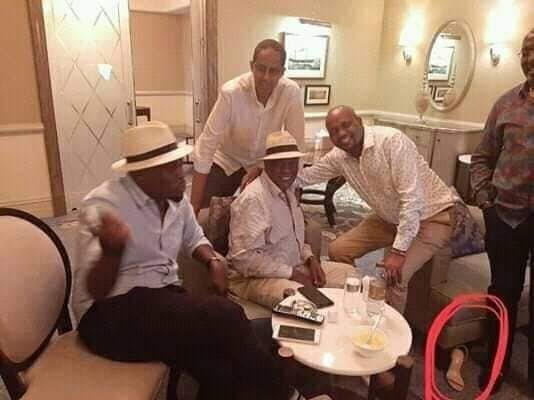 JanetteMumbua's tweet photo. I find myself thinking about this picture a lot and I have to ask. @HonMosesKuria, who’s the owner of the shoe and where is she hiding in this picture? 😂😂 https://t.co/MOPanyBMjf