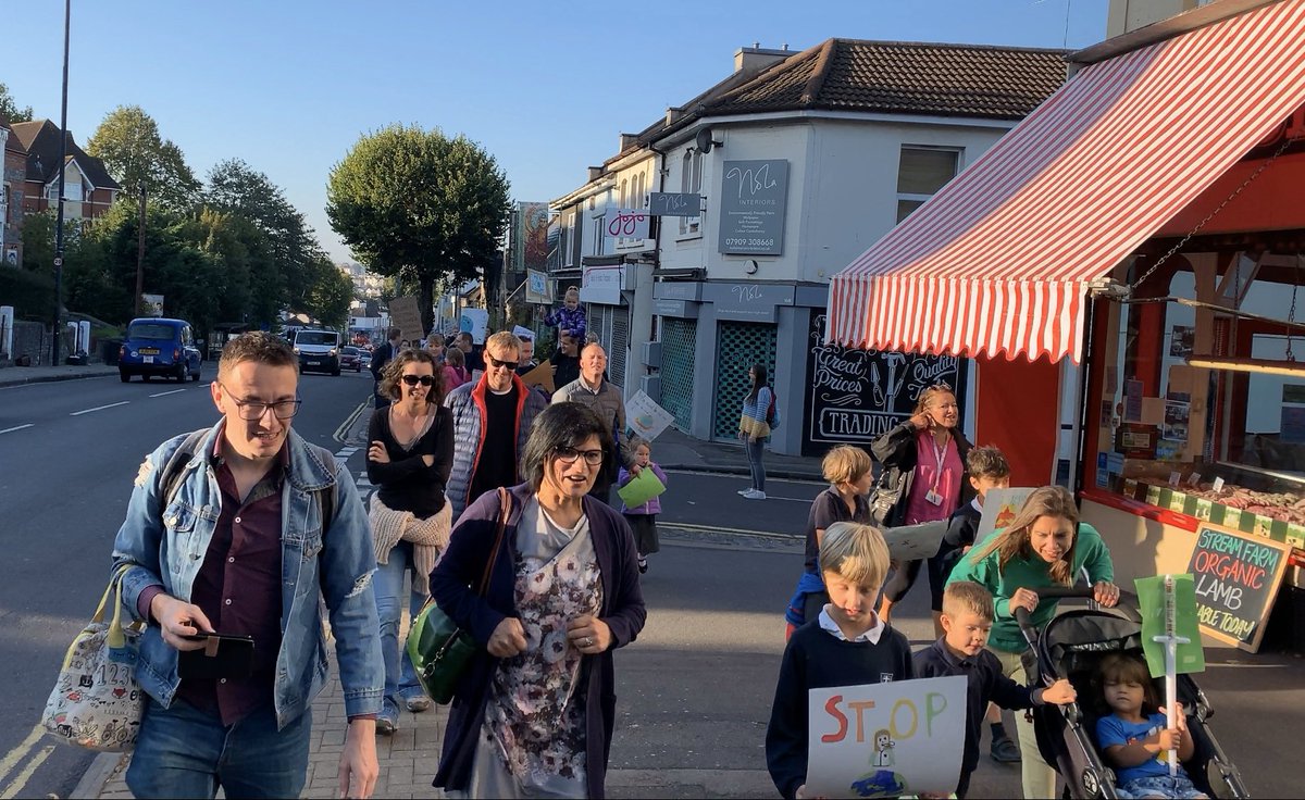 StBonsPrimary's tweet photo. “CLIMATE CHANGE IS NOT A LIE, DO NOT LET OUR PLANET DIE!” sang out from our amazing children and parents on @GloucesterRoad this morning with @ThangamMP #YouthStrike4Climate https://t.co/Lv8HPnurKO