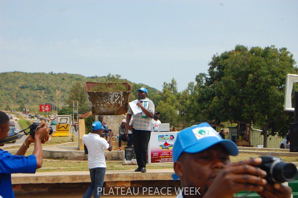 Tech__Diva's tweet photo. We're here only to demonstrate a symbolic exercise of promoting the cause of healing, forgiveness and reconciliation on the Plateau

@PLSPeaceAgency  
@joelengs01
#PlateauPeaceWeek
#ClimateAction https://t.co/pMSdMKAuWC