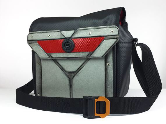 VirealityMovie's tweet photo. Benja Barker, designer of the Bots in #Vireality, is selling these super schway handbags on his online store! Go grab one for yourself at https://t.co/PRodi1W03d! #robot #scifi https://t.co/sMiOZV5Xwi