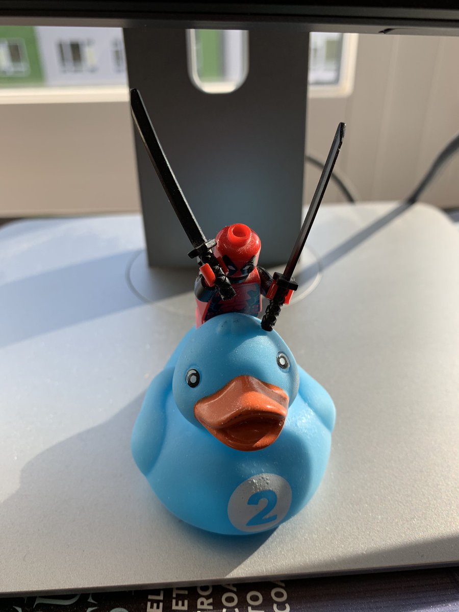 Blue duck with Deadpool LEGO on top