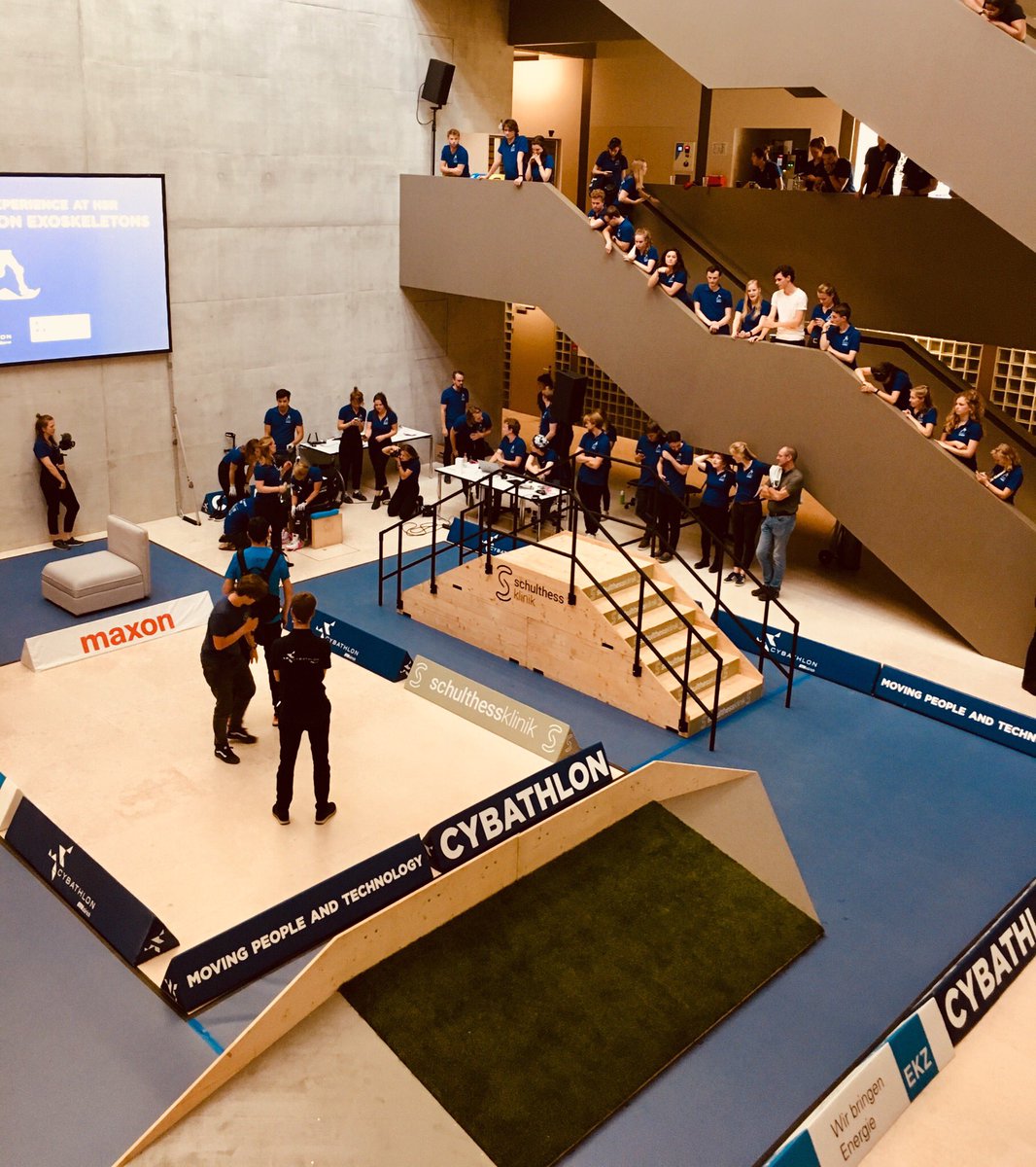 maxonglobal's tweet photo. Today at the CYBATHLON Experience @hsr_rapperswil two teams with their paraplegic pilots demonstrated how current exoskeletons make standing, walking and climbing stairs possible thanks to state-of-the-art assistance technology. #VariLeg #ProjectMarch #CYBATHLON #keepmoving https://t.co/9iZ1AkQxmh