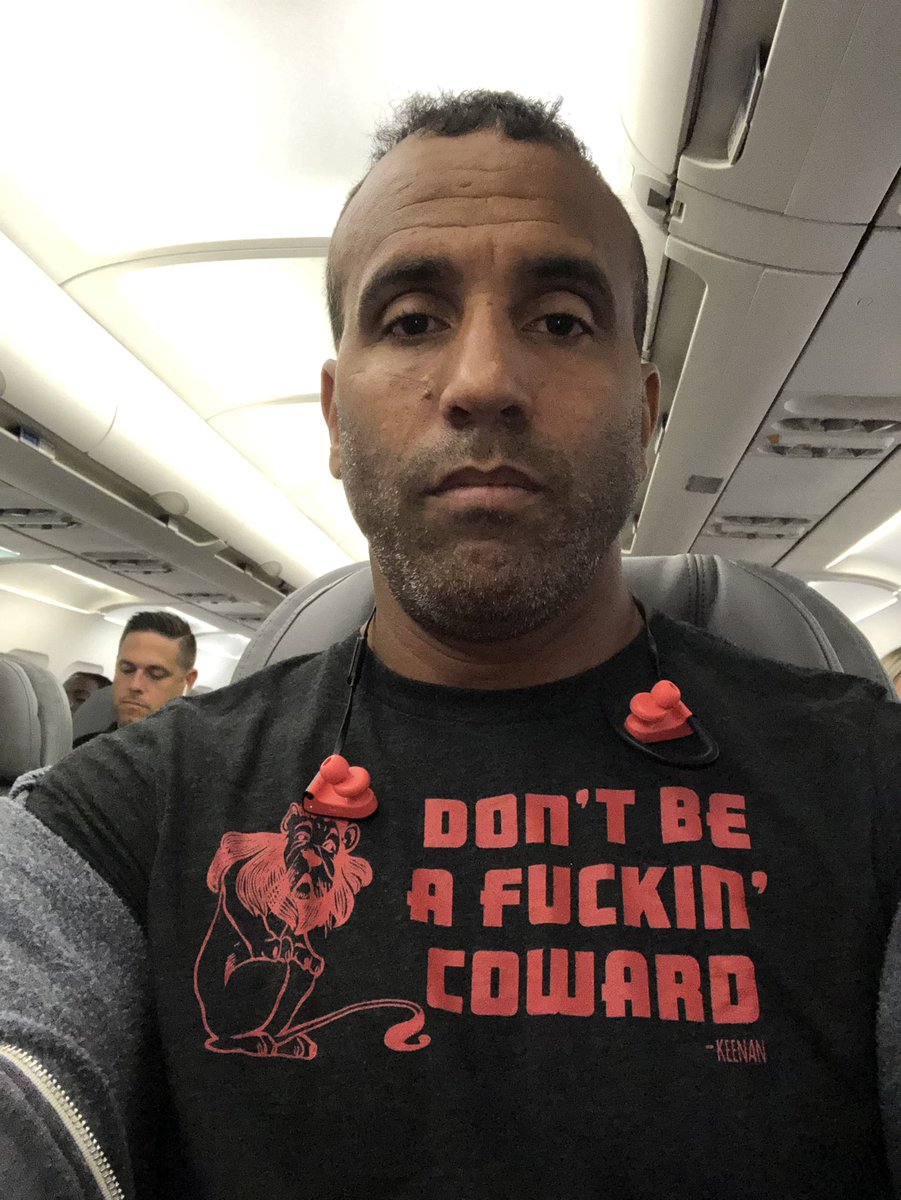 keenan's tweet photo. When a positive message is interpreted as offensive.  I was denied boarding on my @united flight until I covered up, because of my shirt! Is profanity UNIVERSALLY offensive?  #profanitypolice #overkill #tooPC #profanity #CustomerExperience #airlines https://t.co/xDjtSPetK6
