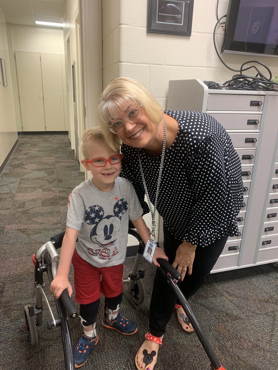 pschlaegel's tweet photo. When your @GranbyKGators friend comes to visit to check out your footwear and share his t-shirt, you have to get a picture!  #funFridayfootwear #webothloveMickey #relationshipsmatter @wcsdistrict #itsworthit https://t.co/otkr13FwYs