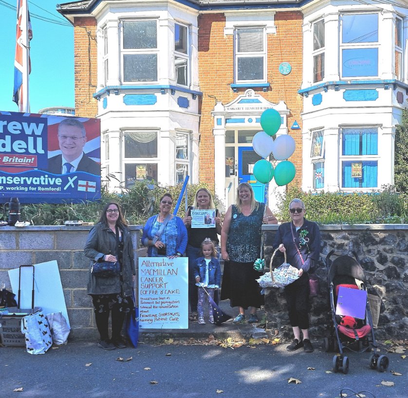 jane_janekeane's tweet photo. #Havering4EU was sad that Johnson's decision to prorogue Parliament meant that #MacMillanCancerSupport Coffee Morning in Parliament was cancelled. So we held our own outside the constituency offices of #AndrewRosindellMP. Front line nurse shortages harm patient care. https://t.co/wF6RibjhX9