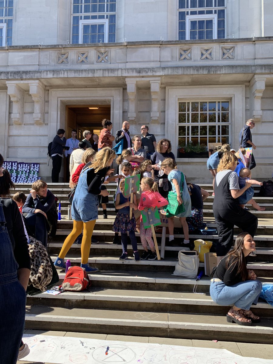 cordula's tweet photo. #GlobalClimateStrikes  at Hackney Townhall today.. good to see the mayor with an XR flag. https://t.co/G96AkrQg7x