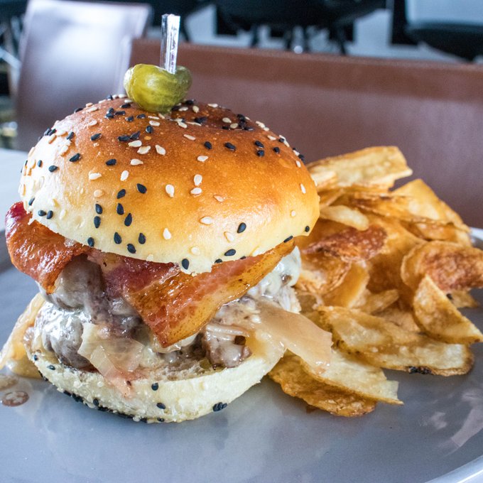 This is your sign! It's time to try the Double-Stacked Prime Rib Burger at <a href="/the51stfloor/">The One Eighty</a>